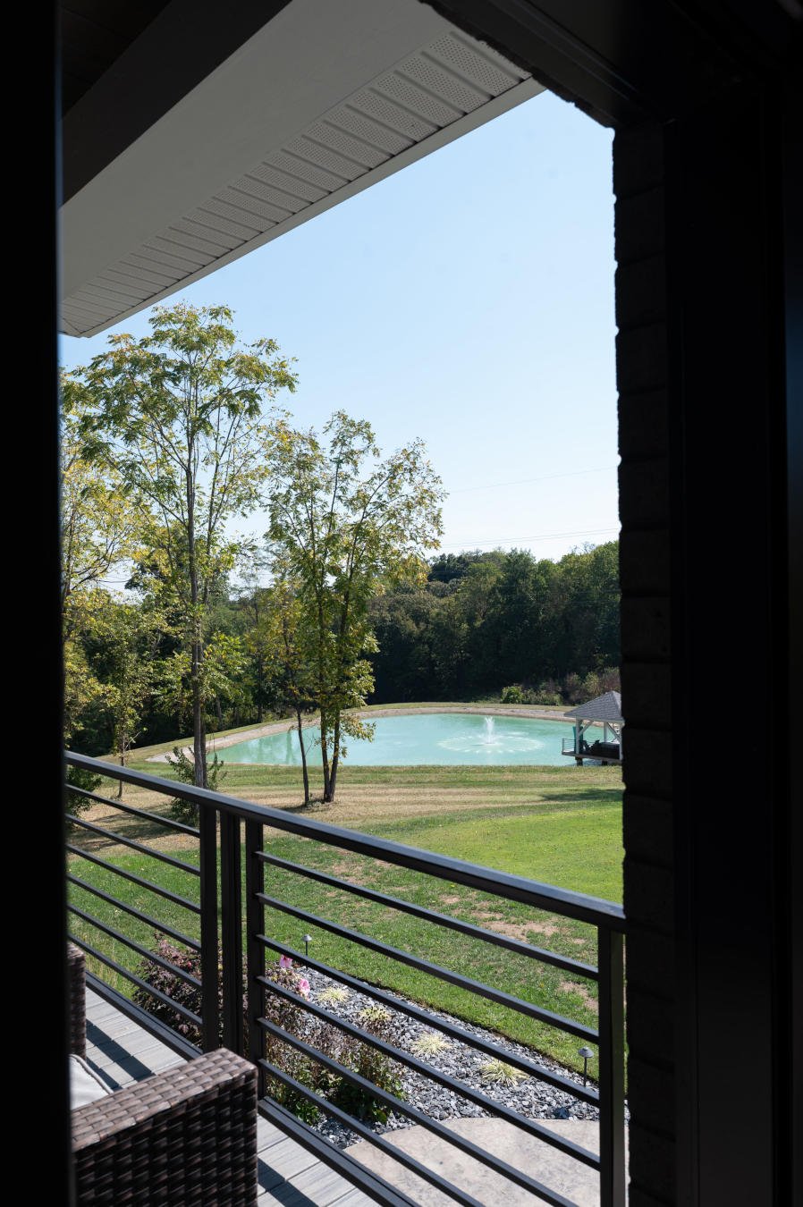 custom home exterior pond and landscape